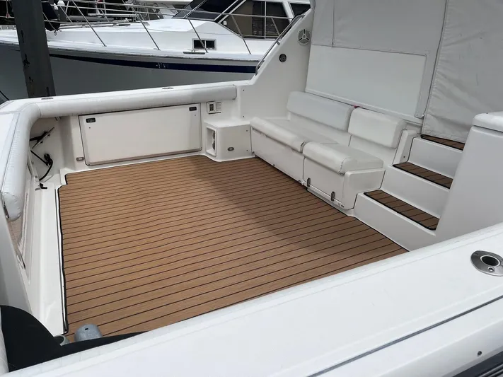 "salty Dog" Yacht Photos Pics 2000 Tiara Yachts 4100 Open with bow thruster, featuring spacious teak deck and seating.