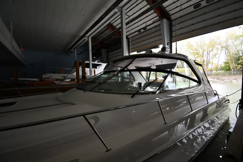  Yacht Photos Pics 2001 Sea Ray 540 Sundancer yacht docked in a covered marina.