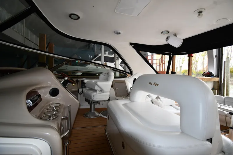  Yacht Photos Pics Interior of 2001 Sea Ray 540 Sundancer yacht with luxurious seating and helm.