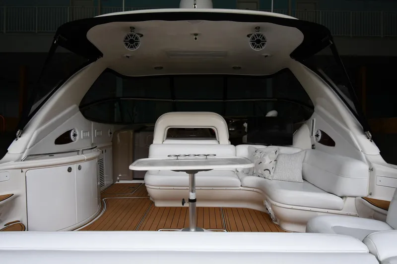  Yacht Photos Pics 2001 Sea Ray 540 Sundancer yacht interior with white seating and wooden flooring.