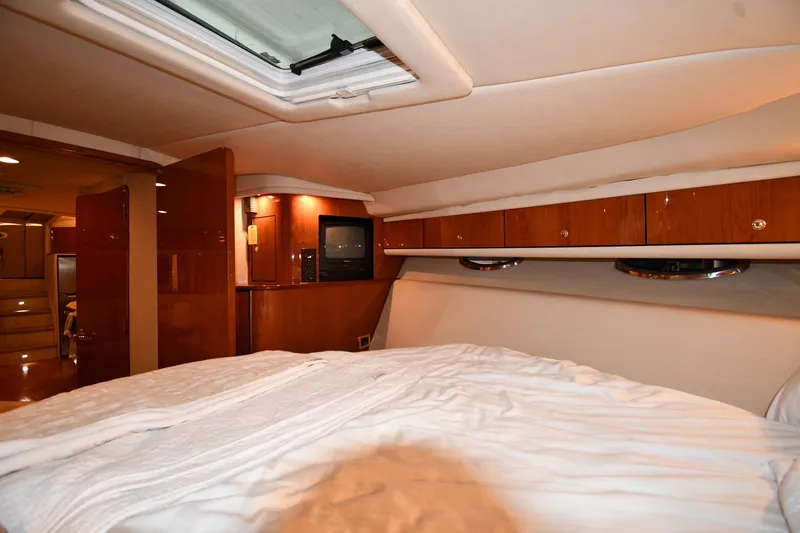  Yacht Photos Pics Luxurious interior of 2001 Sea Ray 540 Sundancer yacht with cozy bedroom.