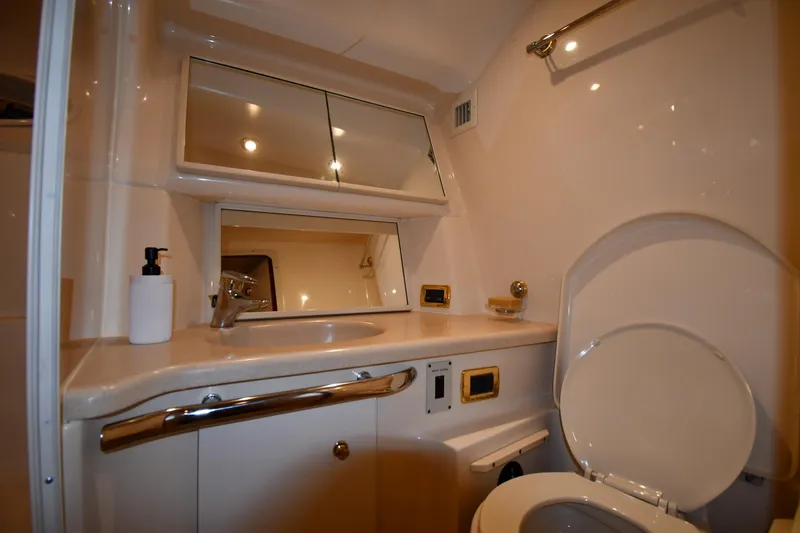  Yacht Photos Pics Luxurious bathroom in 2001 Sea Ray 540 Sundancer yacht, featuring modern fixtures and ample lighting.