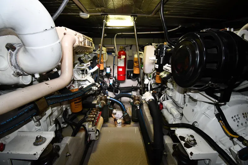  Yacht Photos Pics Engine room of 2001 Sea Ray 540 Sundancer yacht, showcasing mechanical components and systems.