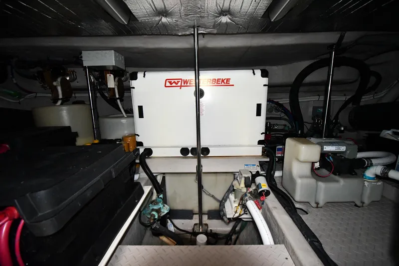  Yacht Photos Pics Engine room of 2001 Sea Ray 540 Sundancer with Westerbeke generator and various mechanical components.