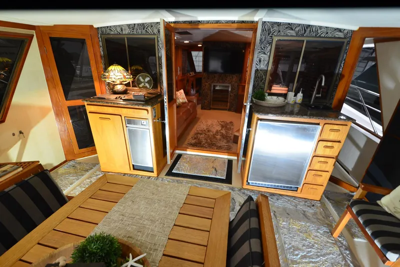  Yacht Photos Pics Luxurious interior of a 1990 Jefferson 52 Marquessa ED yacht with elegant wood finishes.