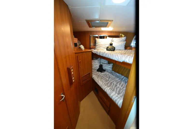  Yacht Photos Pics Cozy cabin with bunk beds in 1990 Jefferson 52 Marquessa ED yacht.
