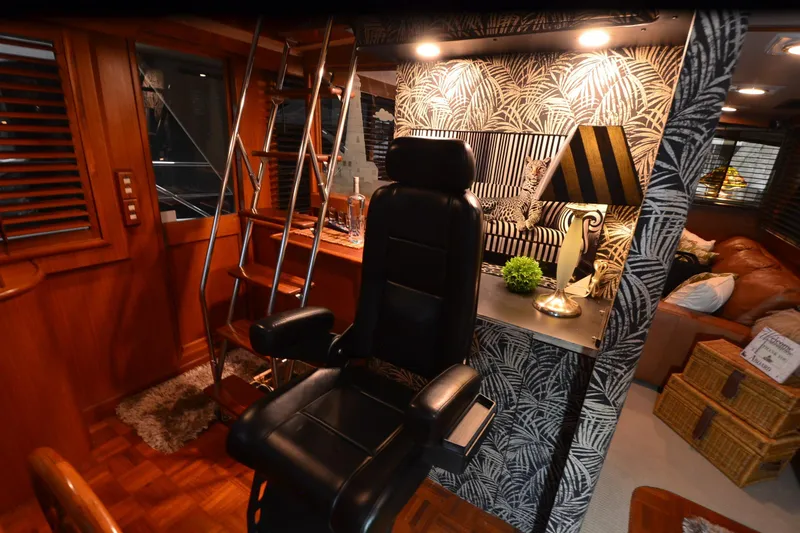  Yacht Photos Pics Luxurious interior of a 1990 Jefferson 52 Marquessa ED yacht with elegant decor and seating.