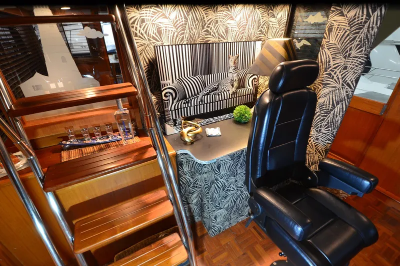  Yacht Photos Pics Luxurious interior of 1990 Jefferson 52 Marquessa ED yacht with elegant decor and seating.