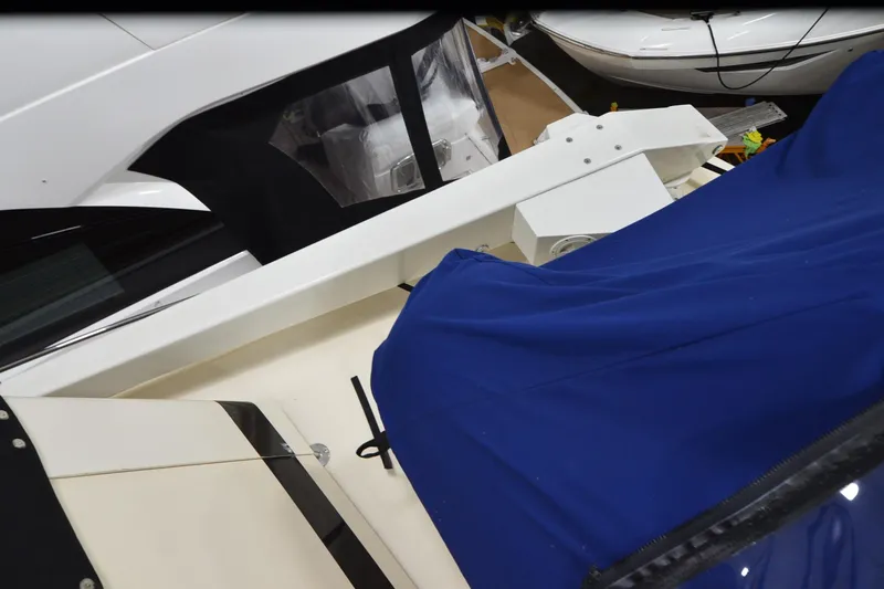  Yacht Photos Pics 1990 Jefferson 52 Marquessa ED yacht with blue cover and white detailing.