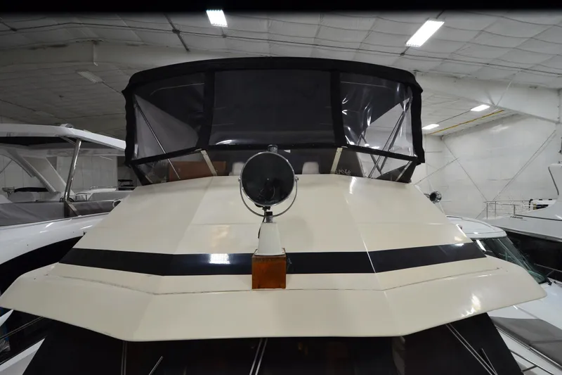  Yacht Photos Pics 1990 Jefferson 52 Marquessa ED yacht in indoor storage, front view.