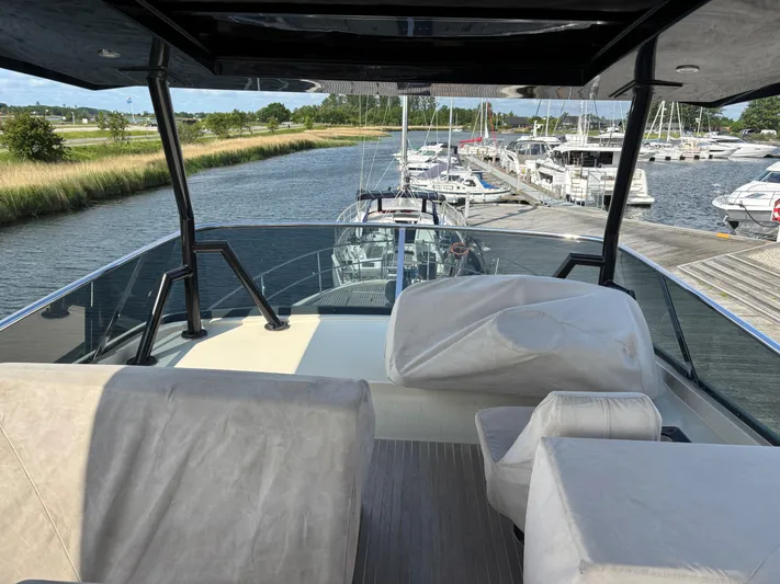  Yacht Photos Pics 2015 Beneteau Monte Carlo 6 yacht interior with marina view.