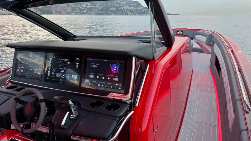 Roman Eagle Yacht Photos Pics 2024 Cigarette 42 Auroris boat interior with advanced digital dashboard and sleek red design.