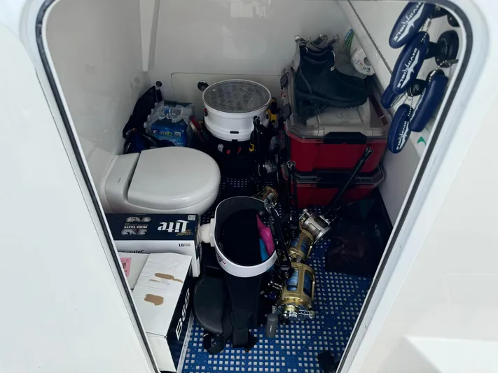  Yacht Photos Pics Storage area on 2020 Invincible 40 Catamaran with fishing gear and supplies.