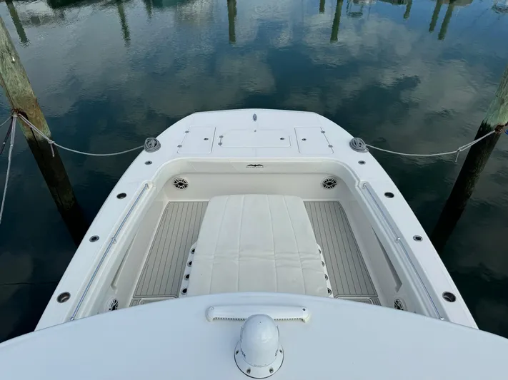  Yacht Photos Pics Invincible 40 Catamaran 2020, spacious deck view, docked on calm water.