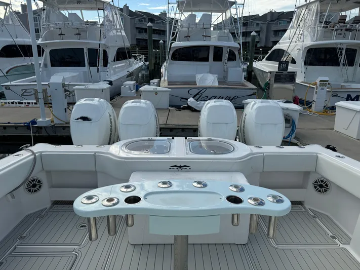  Yacht Photos Pics Invincible 40 Catamaran 2020 docked with multiple outboard engines and fishing setup.