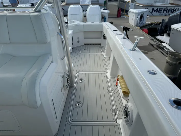  Yacht Photos Pics Invincible 40 Catamaran 2020 interior with white seating and deck details.