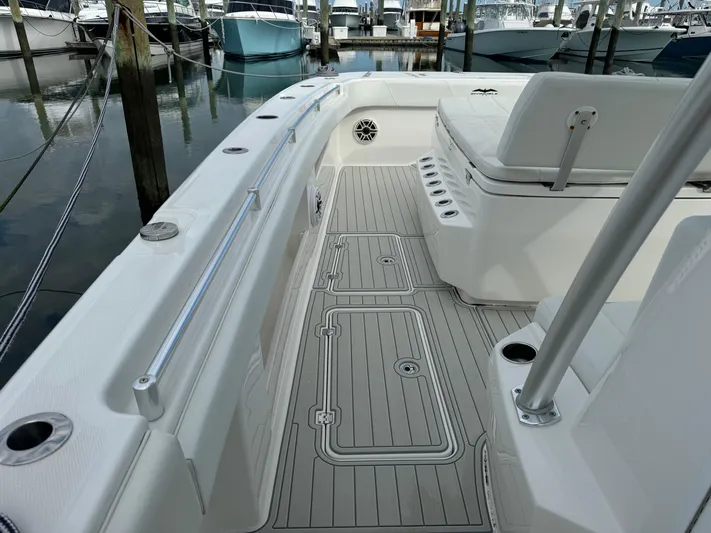  Yacht Photos Pics Invincible 40 Catamaran 2020 model, sleek deck design, docked at marina.