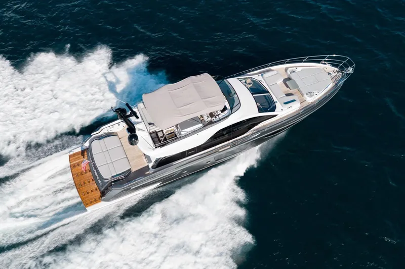 Second Chances Yacht Photos Pics 2024 Azimut S7 yacht cruising on open water, aerial view.