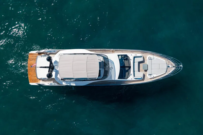 Second Chances Yacht Photos Pics Aerial view of 2024 Azimut S7 luxury yacht on clear blue water.