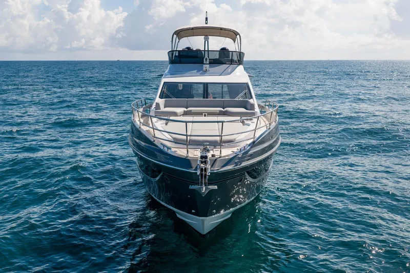 Second Chances Yacht Photos Pics 2024 Azimut S7 yacht on open sea, front view under clear sky.