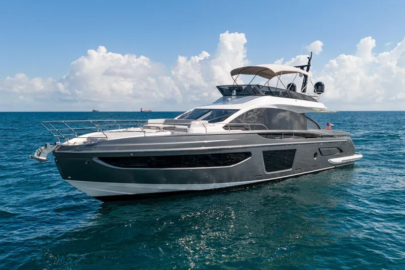 Second Chances Yacht Photos Pics 2024 Azimut S7 yacht cruising on open sea under clear skies.