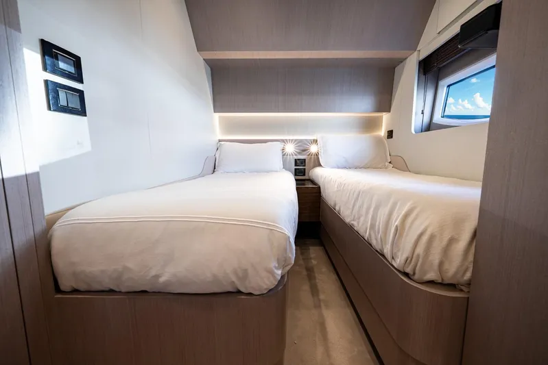 Second Chances Yacht Photos Pics 2024 Azimut S7 yacht cabin with twin beds and modern interior design.