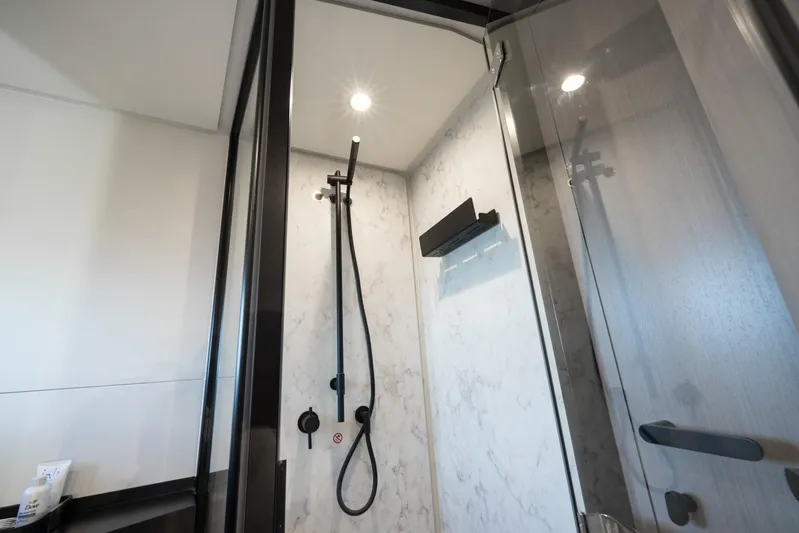 Second Chances Yacht Photos Pics Luxurious shower in 2024 Azimut S7 yacht, featuring modern fixtures and elegant design.