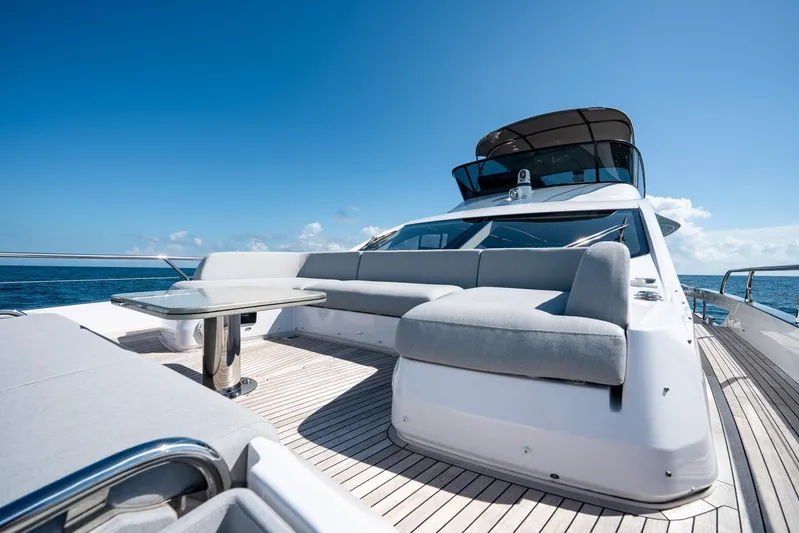 Second Chances Yacht Photos Pics Luxurious 2024 Azimut S7 yacht deck with elegant seating and ocean view.