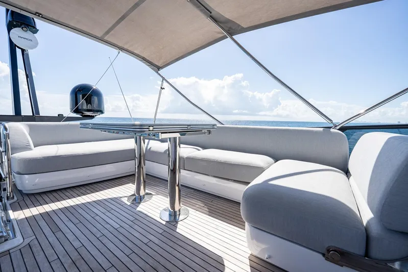 Second Chances Yacht Photos Pics Luxurious 2024 Azimut S7 yacht deck with elegant seating and ocean view.