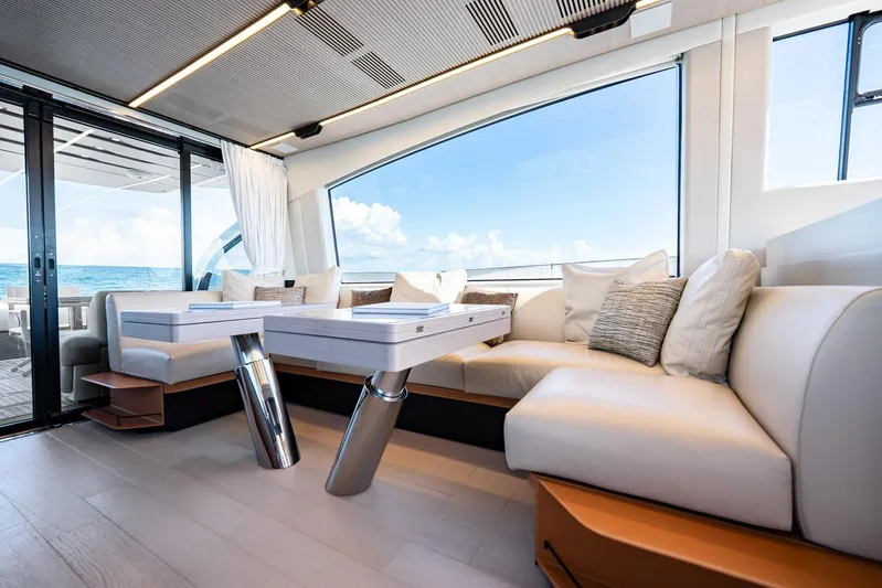 Second Chances Yacht Photos Pics Luxurious interior of 2024 Azimut S7 yacht with elegant seating and ocean view.