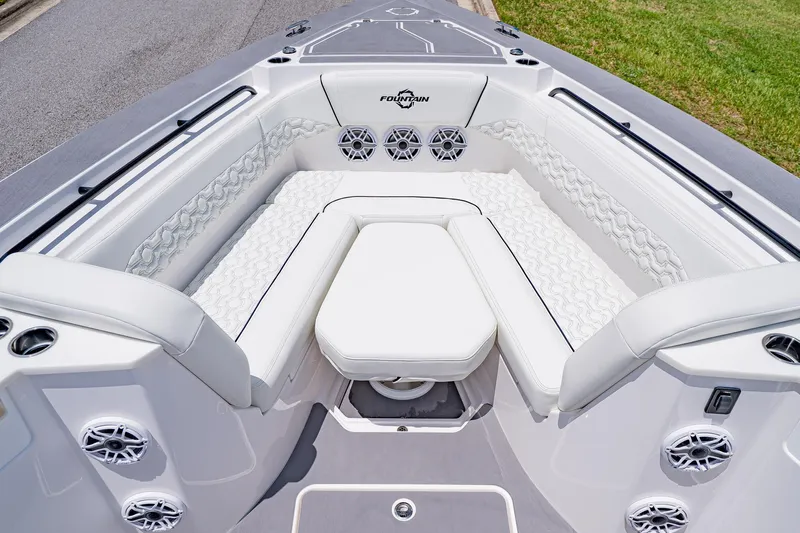  Yacht Photos Pics 2026 Fountain 38 SCX boat interior with luxurious white seating and modern design.