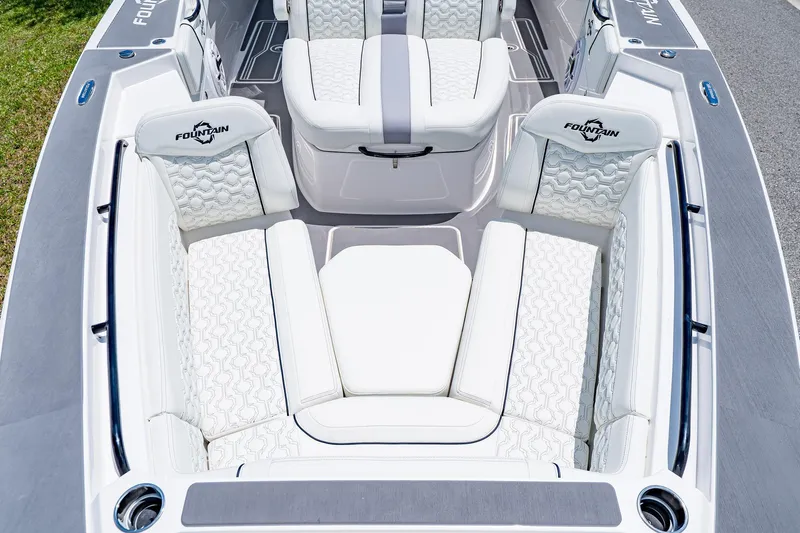  Yacht Photos Pics 2026 Fountain 38 SCX boat interior with luxurious white seating and stylish design.