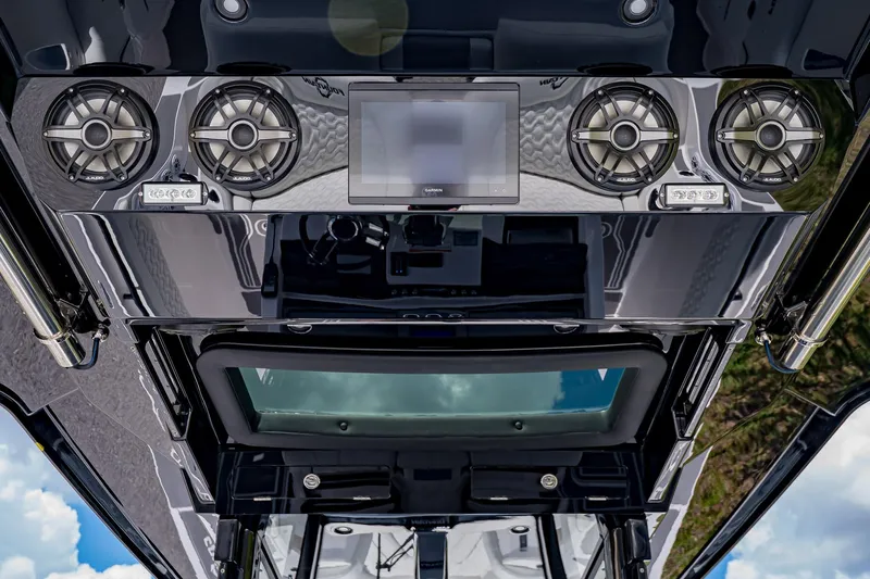  Yacht Photos Pics 2026 Fountain 38 SCX boat dashboard with speakers and touchscreen display.