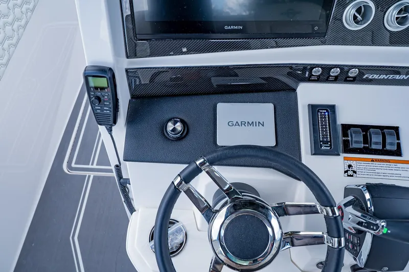  Yacht Photos Pics Control panel of 2026 Fountain 38 SCX boat with Garmin navigation system.