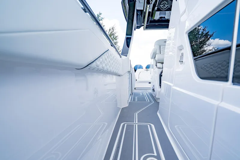  Yacht Photos Pics 2026 Fountain 38 SCX boat interior with sleek white design and modern features.