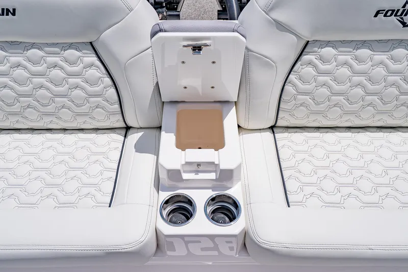  Yacht Photos Pics Luxury seating on 2026 Fountain 38 SCX boat with cup holders and storage.