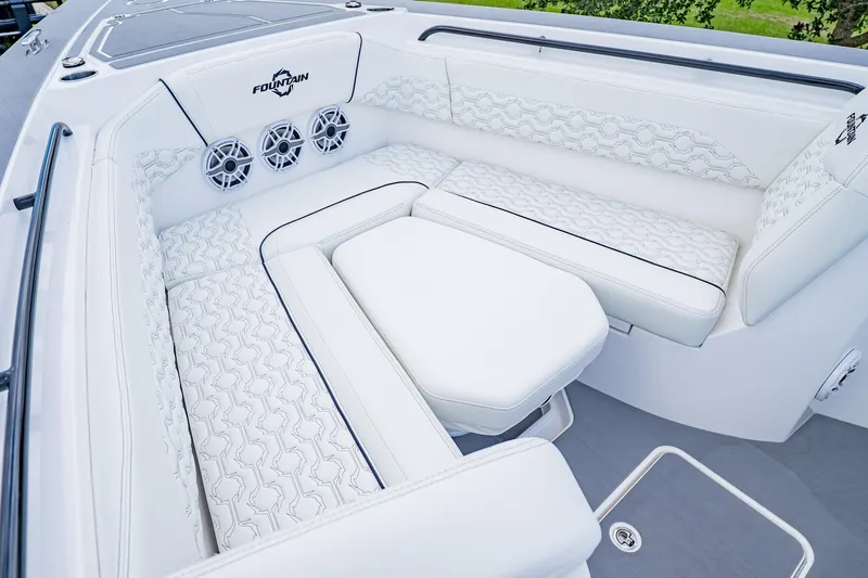  Yacht Photos Pics Luxurious seating area on 2026 Fountain 38 SCX boat with stylish white upholstery.