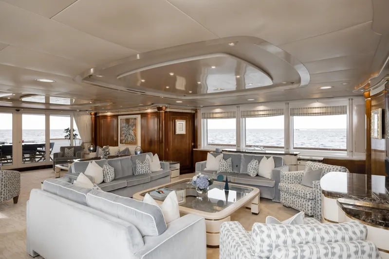 Olympus Yacht Photos Pics Luxurious interior of 1996 Feadship motor yacht with elegant seating and ocean view.