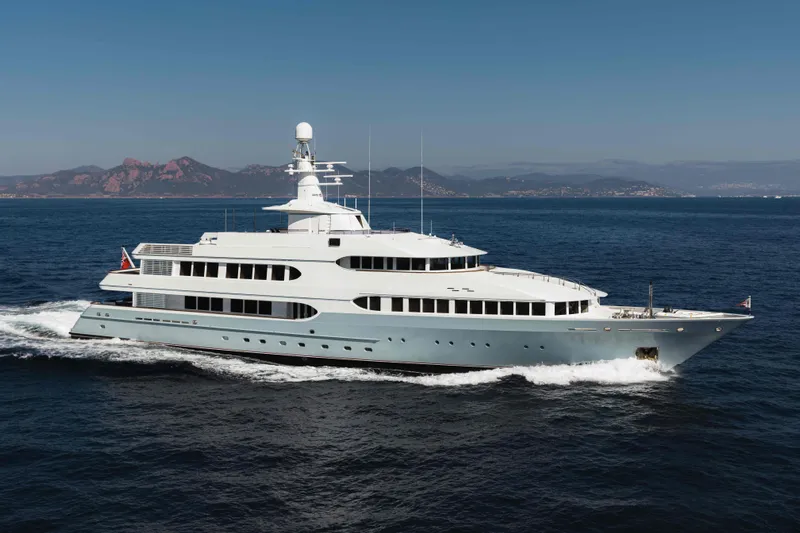 Olympus Yacht Photos Pics Luxurious 1996 Feadship Full Displacement Motor Yacht cruising on open sea.