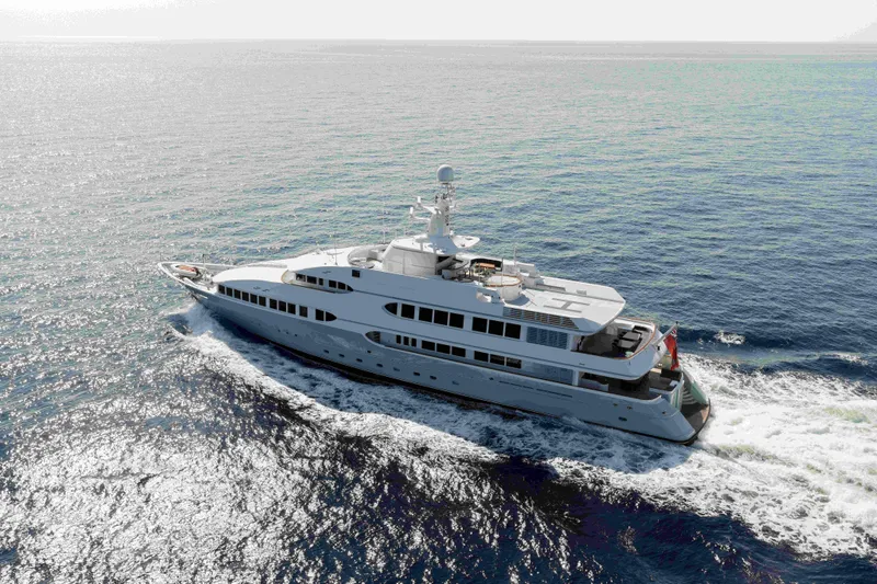 Olympus Yacht Photos Pics Luxurious 1996 Feadship motor yacht cruising on open sea.