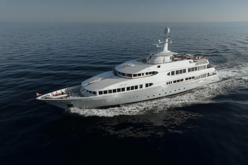 Olympus Yacht Photos Pics Luxurious 1996 Feadship Full Displacement Motor Yacht cruising on open sea.