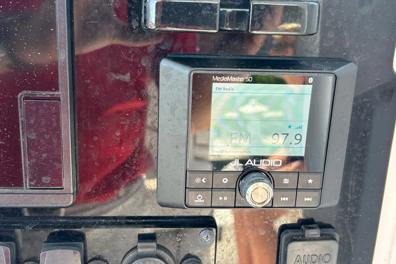  Yacht Photos Pics Close-up of JL Audio MediaMaster 50 on 2021 Sea Hunt Gamefish 25 boat dashboard.