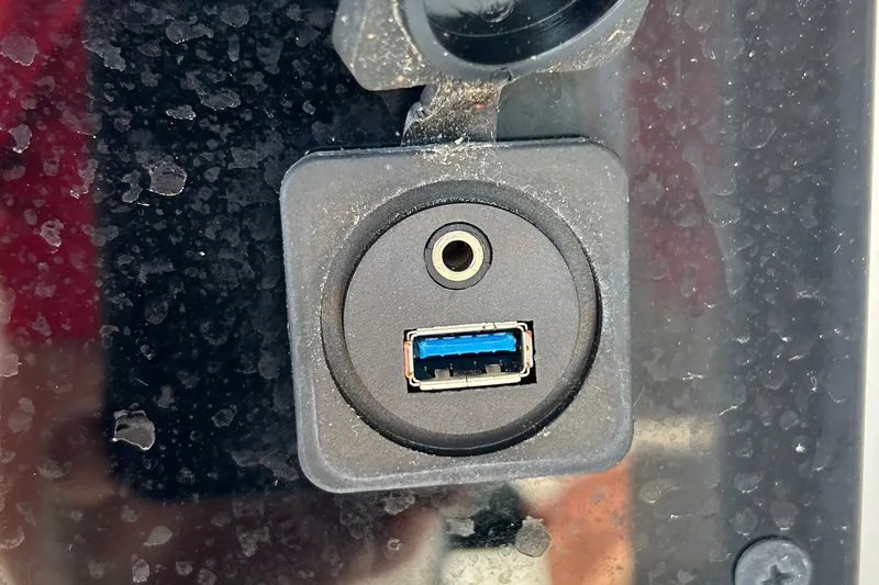  Yacht Photos Pics USB and audio port on 2021 Sea Hunt Gamefish 25 boat dashboard.