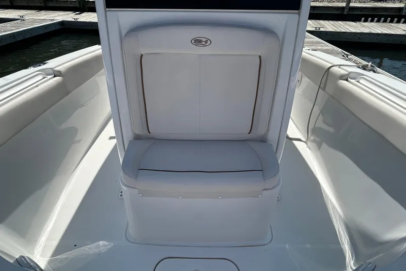  Yacht Photos Pics 2021 Sea Hunt Gamefish 25 boat interior with white seating and sleek design.