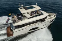 Luxury Absolute 52 Navetta yacht cruising on open water, 2021 model.