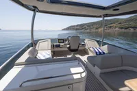 Luxurious 2021 Absolute 52 Navetta yacht interior with scenic ocean view.