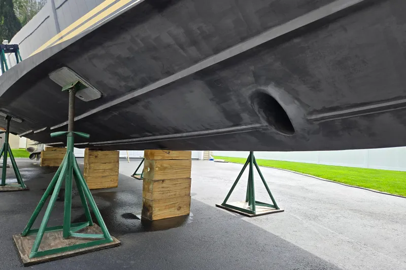 Let's Go! Yacht Photos Pics 2007 Fountain 38 Express Cruiser on stands, showing hull and support structure.