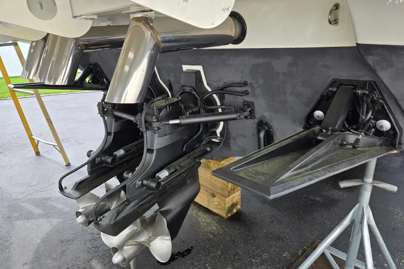 Let's Go! Yacht Photos Pics 2007 Fountain 38 Express Cruiser stern with dual propellers and trim tabs.