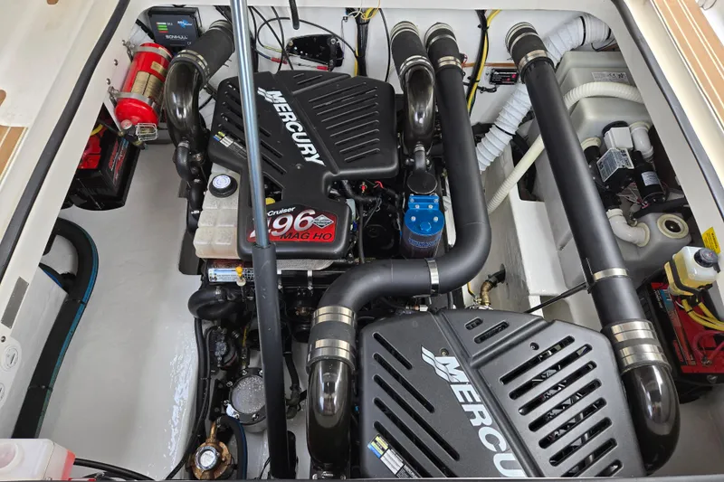 Let's Go! Yacht Photos Pics Engine compartment of 2007 Fountain 38 Express Cruiser with Mercury 496 MAG HO engine.