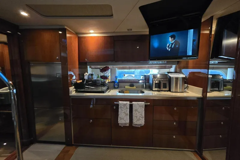  Yacht Photos Pics Luxurious kitchen interior of 2010 Sea Ray 470 Sundancer yacht with modern appliances.